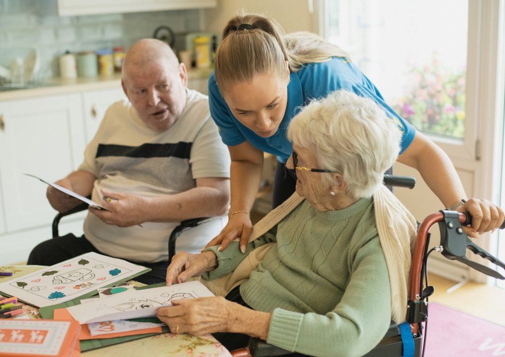 Support staff working one-on-one with clients at a Brighter Horizon day program