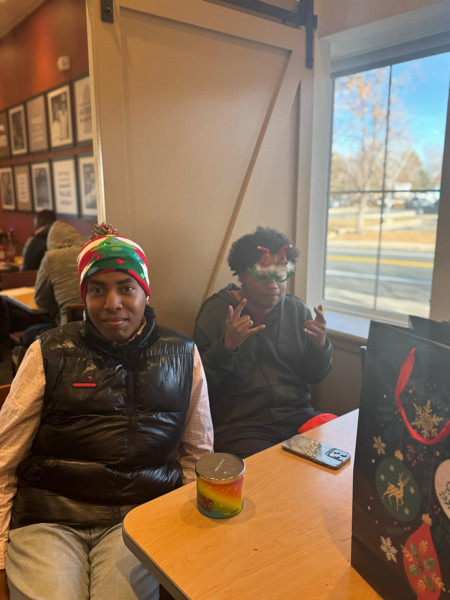 Brighter Horizon clients exchanging gifts during a holiday community party